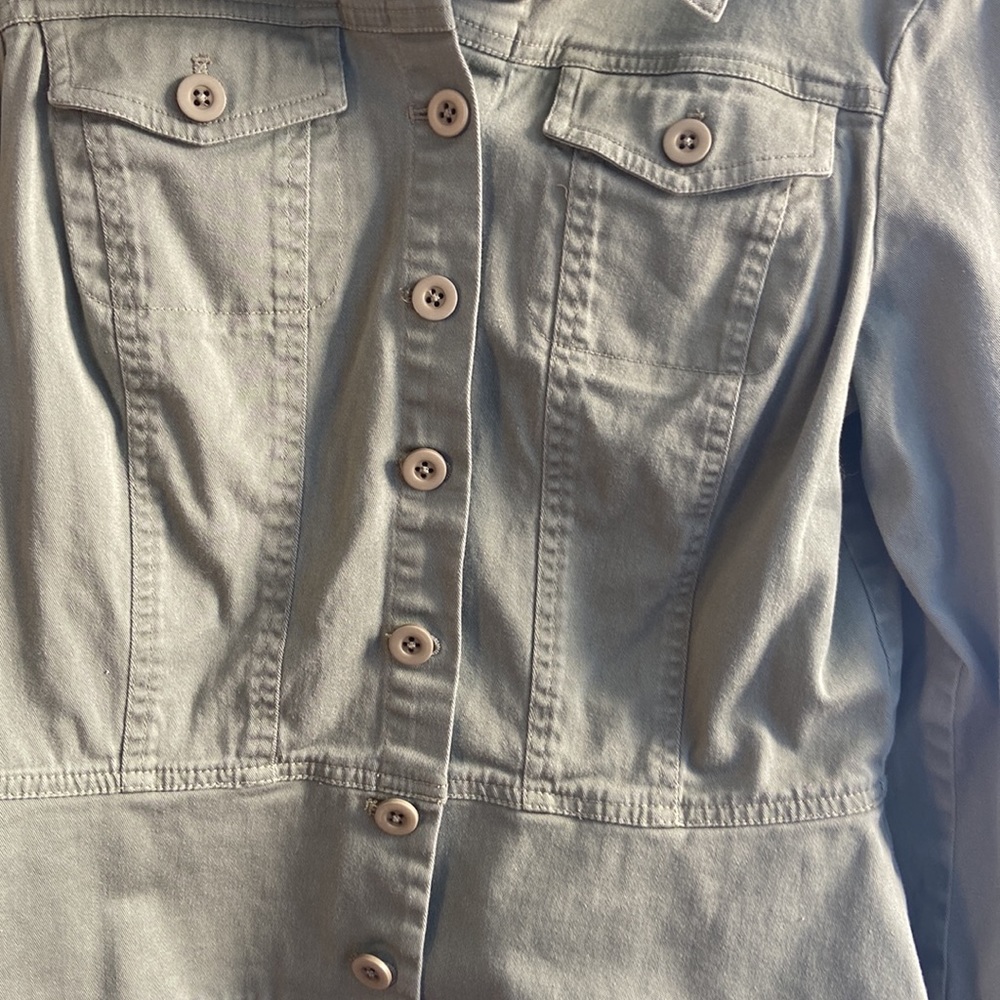 a green button down jacket - Picture 3 of 5